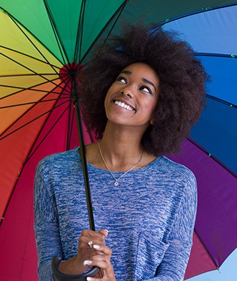 Smiling woman with umbrella
