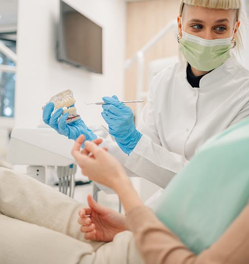 Dentist discussing the process with a patient