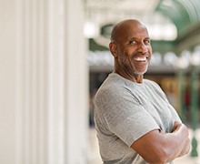 Confident, healthy man with dental implants in Plano