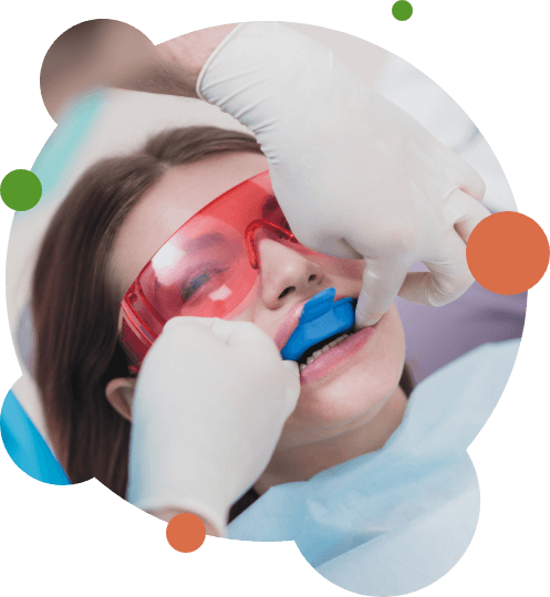 Little girl receiving a fluoride treatment