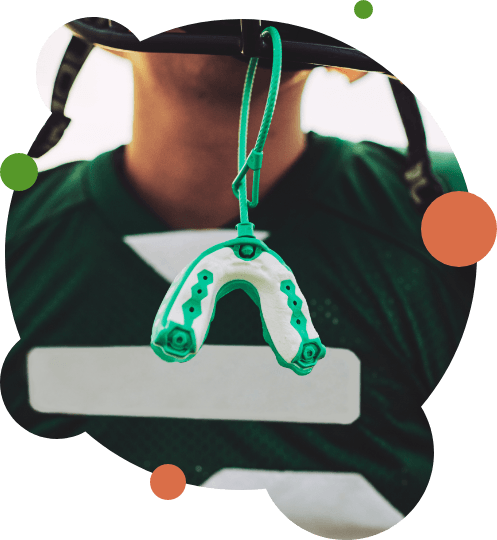 Close-up of mouthguard attached to football helmet