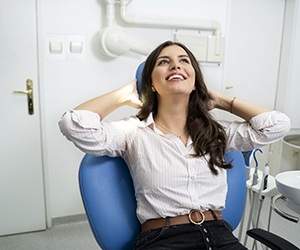 Woman relaxing after sedation dentistry in Plano