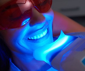 person getting in-office teeth whitening 