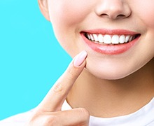 person smiling about the cost of teeth whitening in Plano