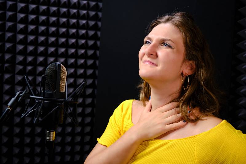Patient rubbing their throat due to dry mouth