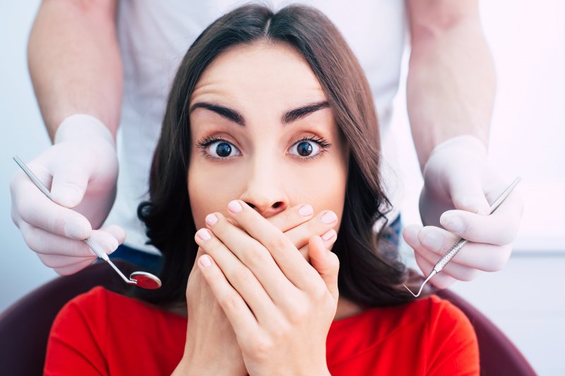 female patient scared at dentist in Plano