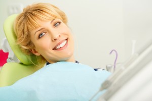 Patient sitting in dental chair